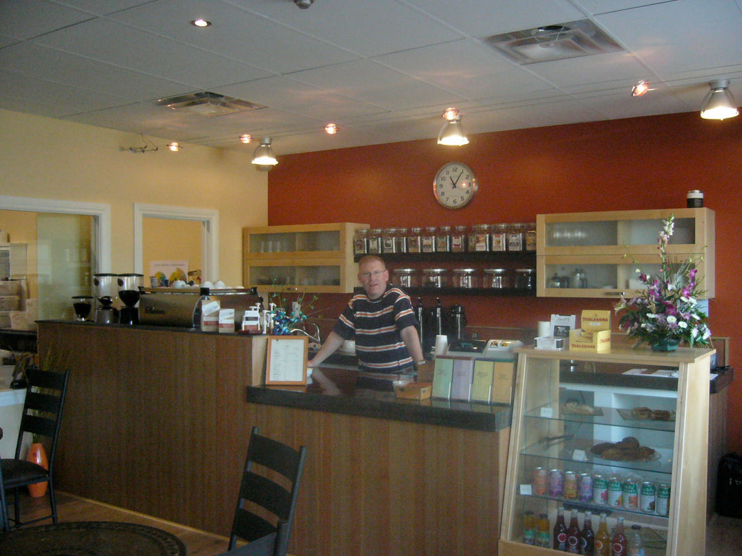 Poul standing behind bar at Original Transcend Cafe